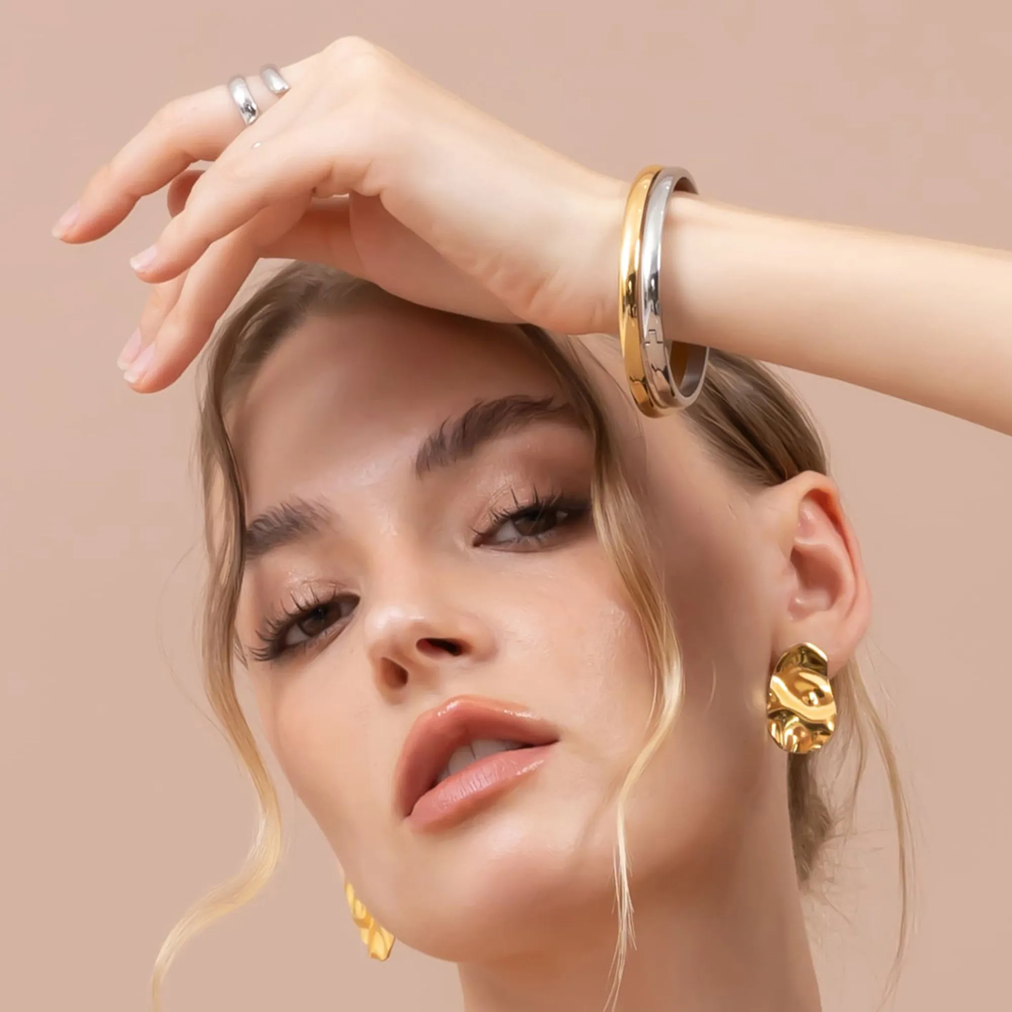 Solid Round Stainless Steel Bangle in Gold